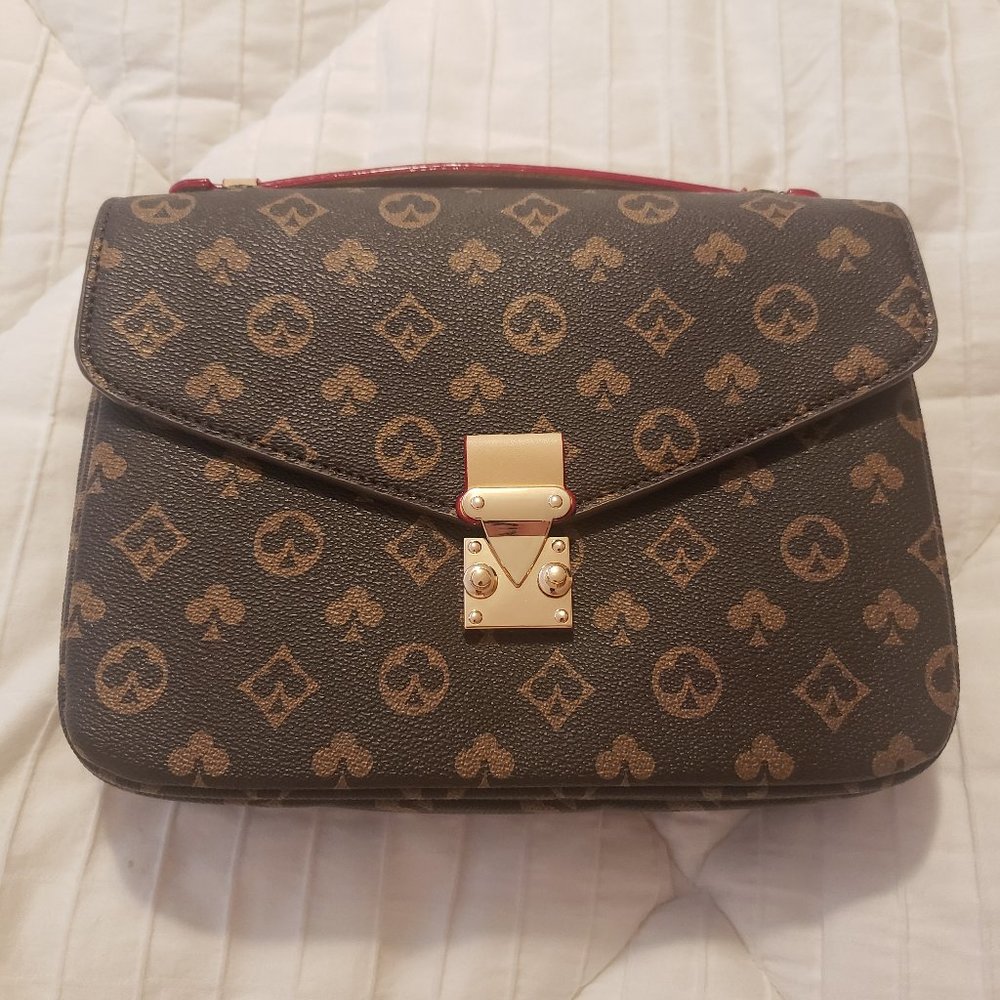 Crossbody/shoulder handbag